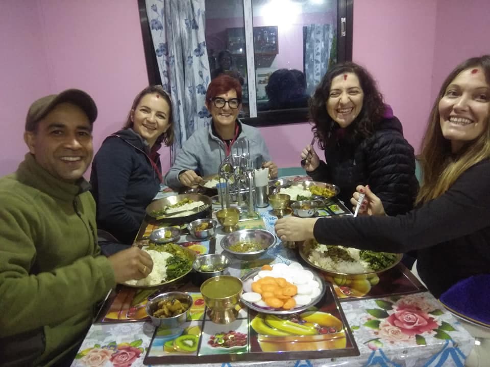 People Eating Traditional Nepali Food